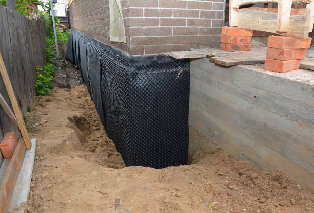 SJ Waterproofing Pros technician performing targeted Emergency Waterproofing assessment in Bradford, PA